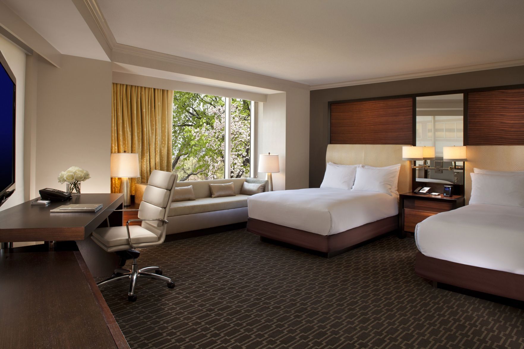 Premium bedding, down comforters, pillowtop beds, in-room safe