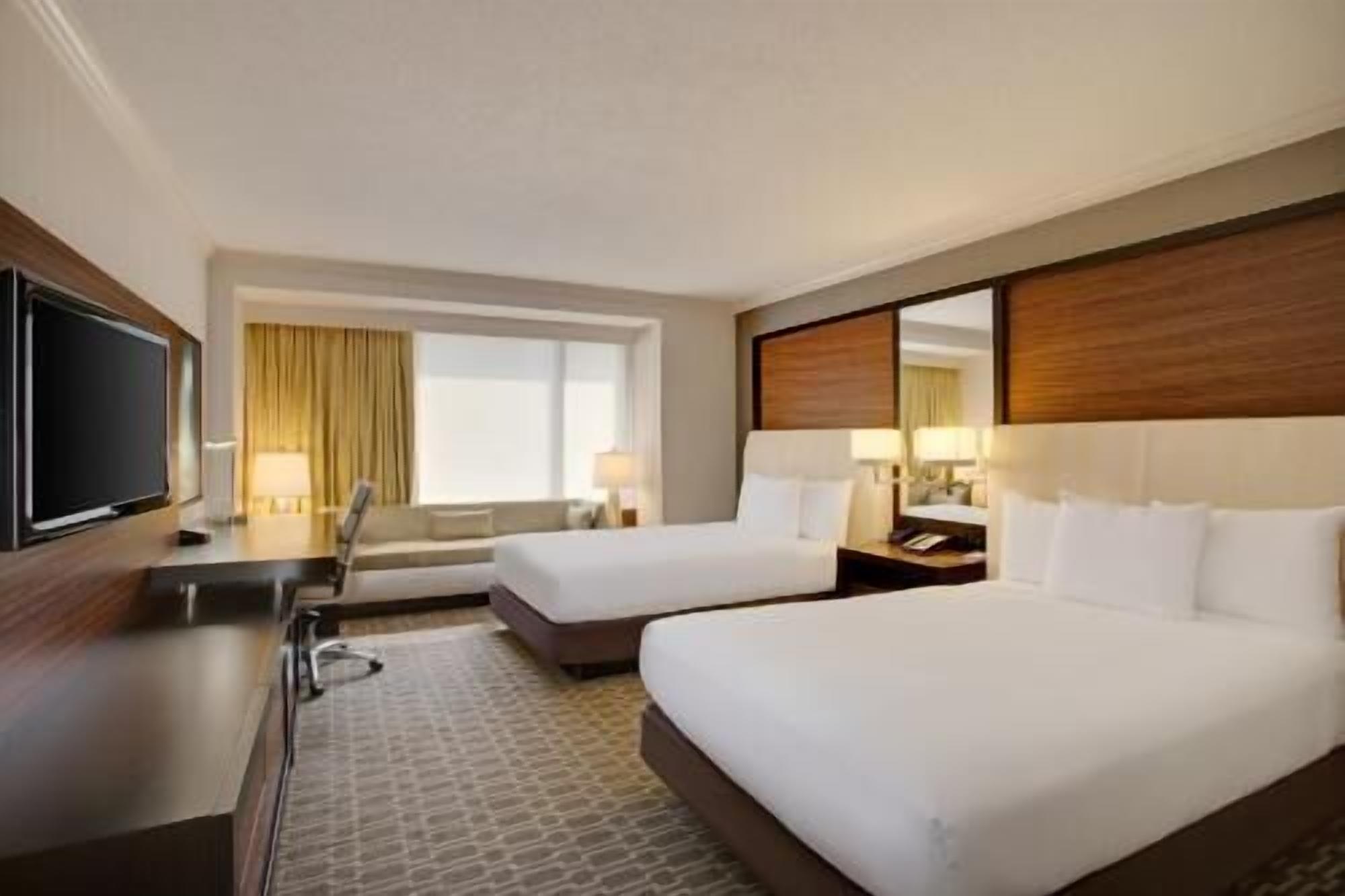 Premium bedding, down comforters, pillowtop beds, in-room safe