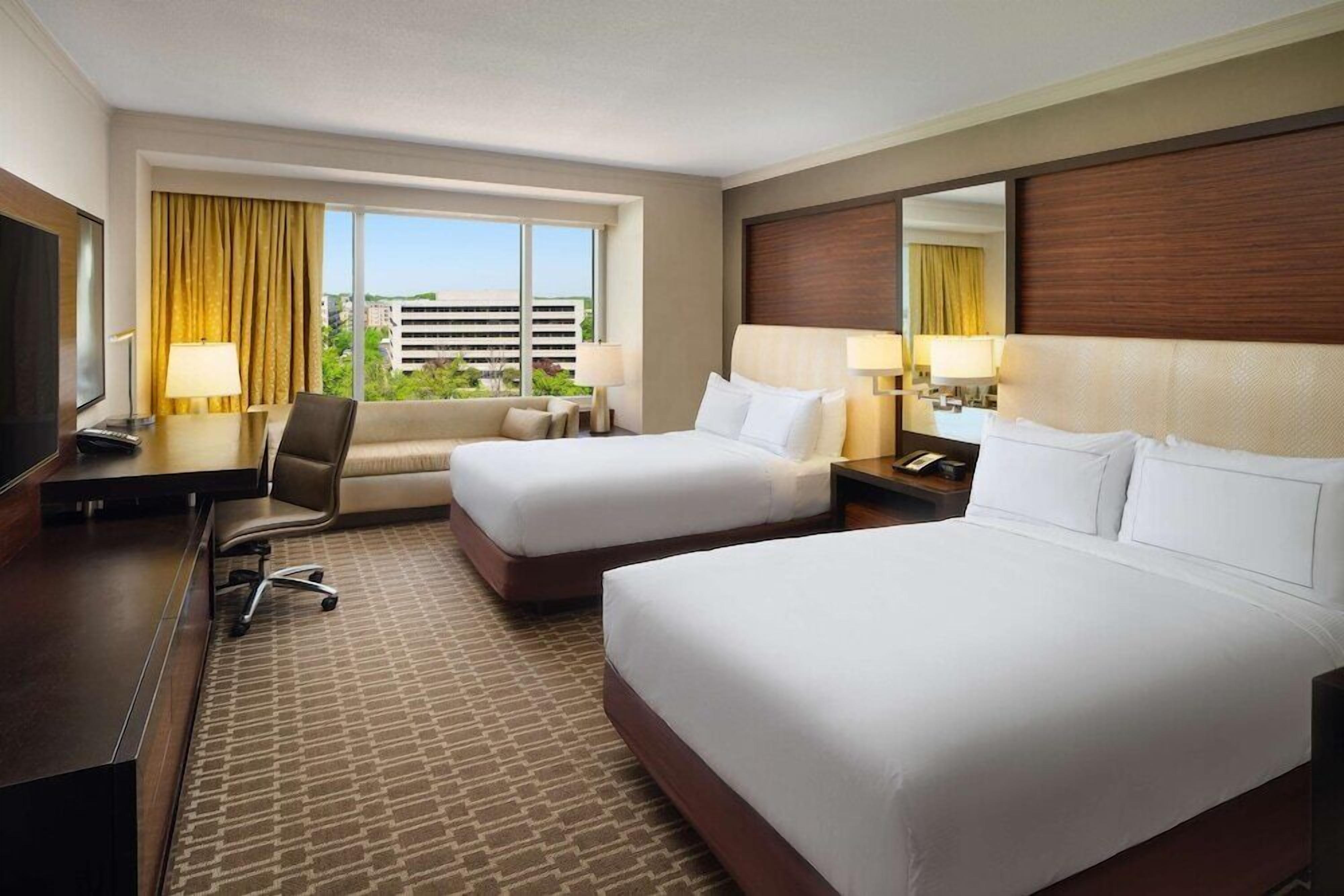 Premium bedding, down comforters, pillowtop beds, in-room safe