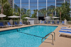 Outdoor pool, open 9:00 AM to 10:00 PM, pool umbrellas, sun loungers