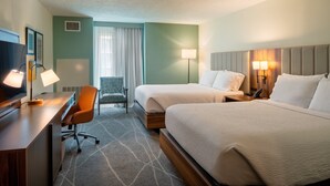 A hotel room with two beds, a desk, a chair, and a TV. -  Holiday Inn Express & Suites Charleston DWTN - Medical CTR by IHG (Charleston)