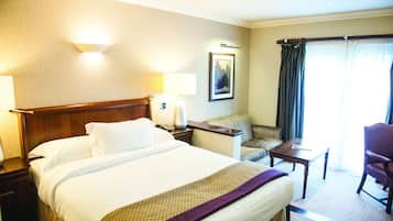 Premium bedding, desk, laptop workspace, iron/ironing board