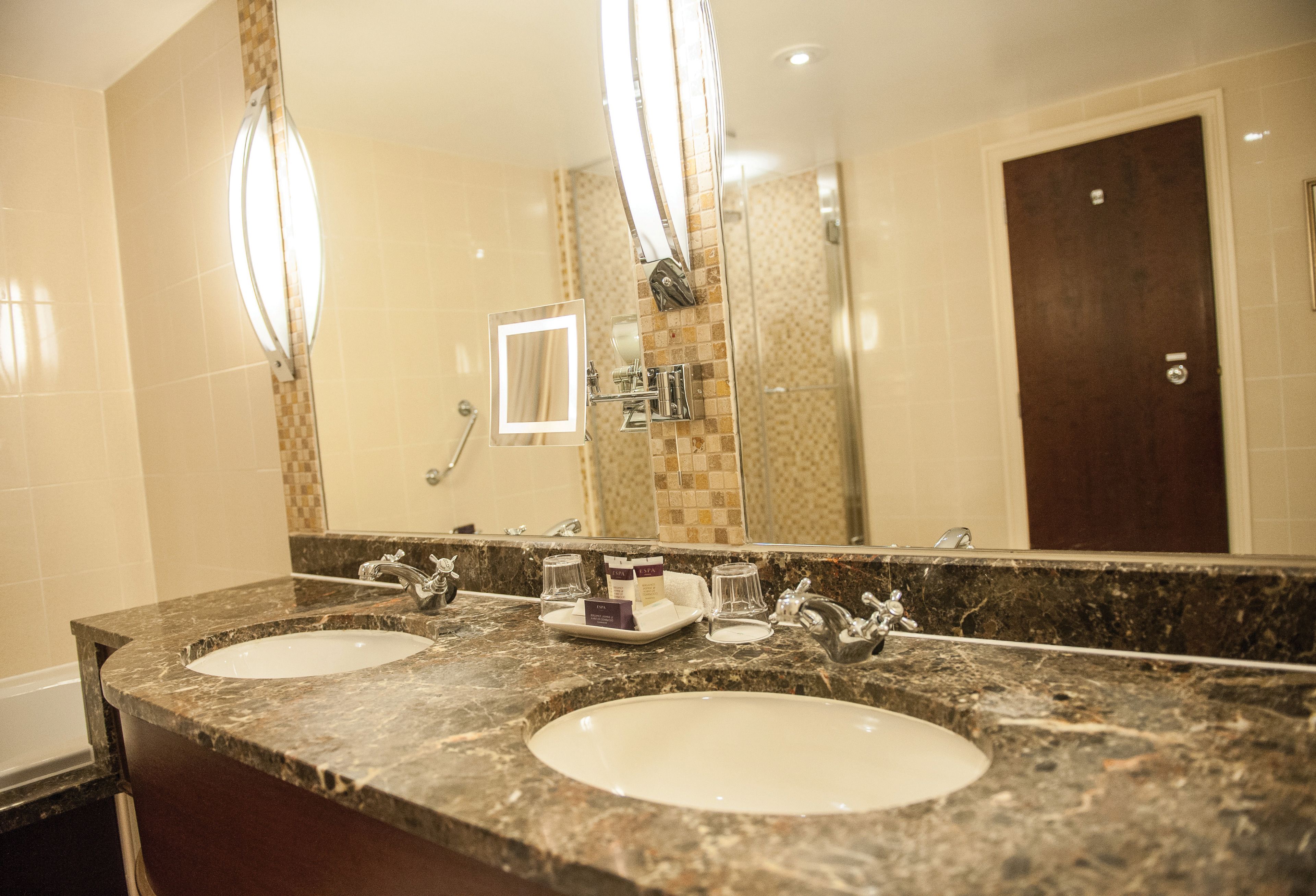 junior suite | bathroom | eco-friendly toiletries, hair dryer, bathrobes, slippers