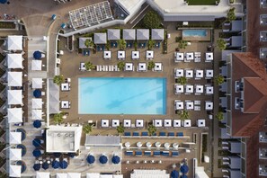 Outdoor pool, open 8:00 AM to 8:00 PM, pool cabanas (surcharge)