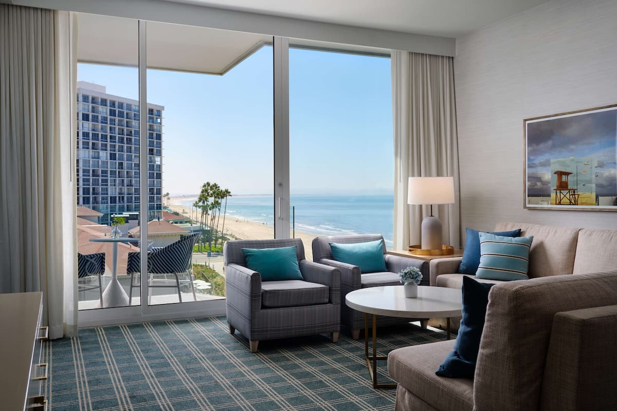 The Views Ocean View Suite 1 King | Living area | 55-inch TV with cable channels, Netflix, streaming services