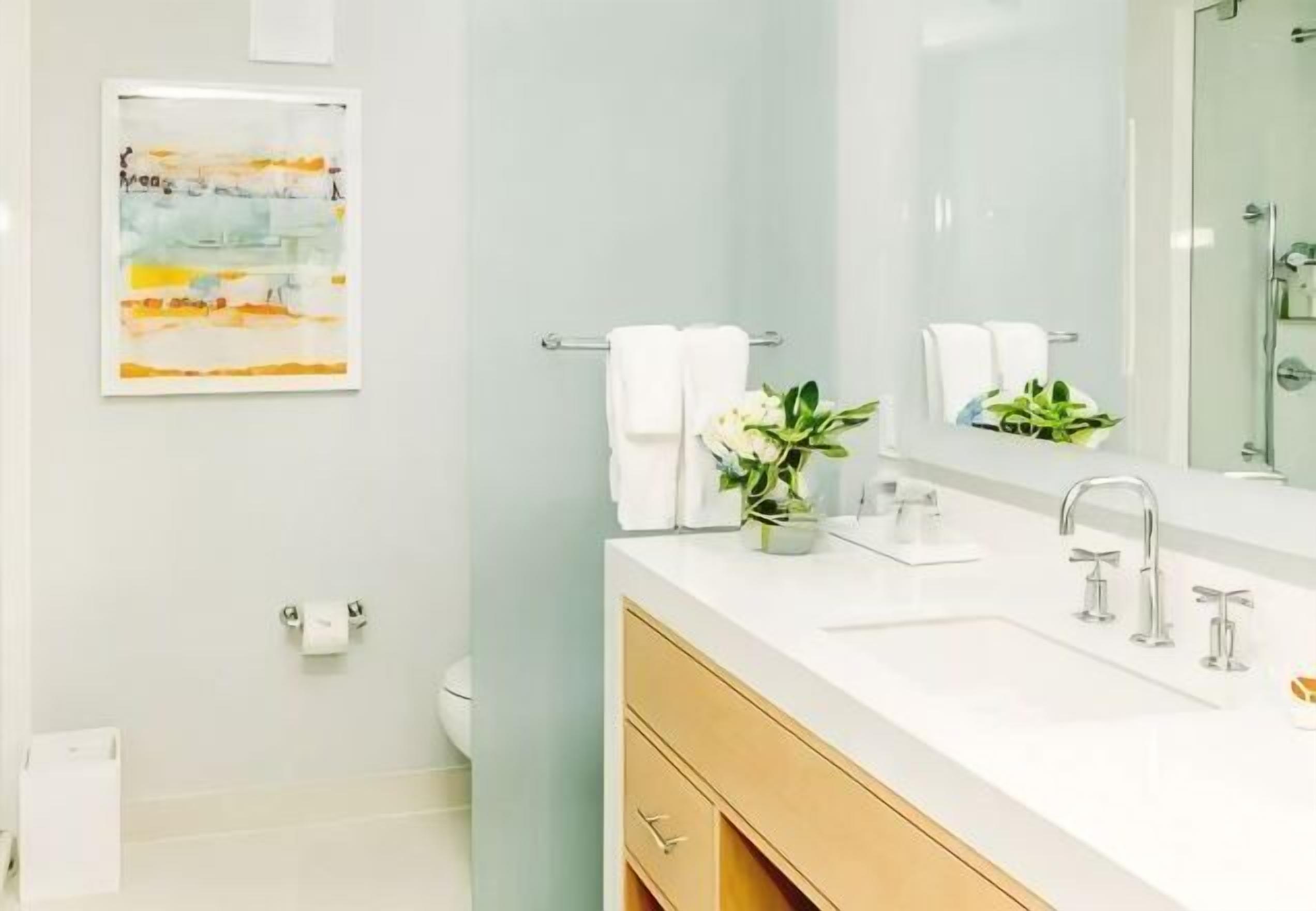 Bathroom | Designer toiletries, hair dryer, bathrobes, towels