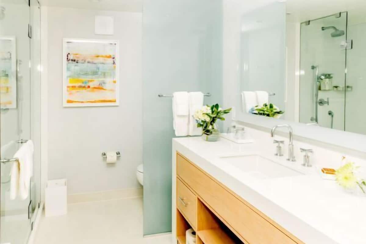 Bathroom | Designer toiletries, hair dryer, bathrobes, towels