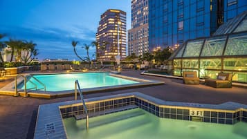 Outdoor pool, a rooftop pool, pool loungers