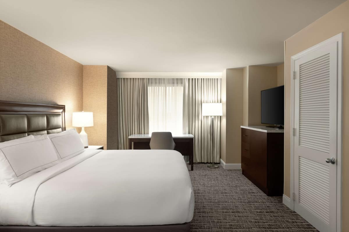 Suite, 1 King Bed | 1 bedroom, premium bedding, in-room safe, desk