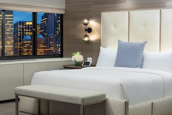 Suite, 1 King Bed | Premium bedding, pillowtop beds, in-room safe, desk at The Manhattan at Times Square Hotel, an IHG Hotel
