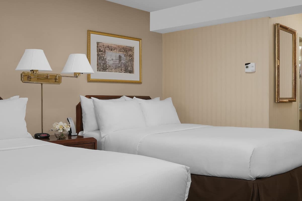 Ropa de cama de alta calidad y camas con pillow-top