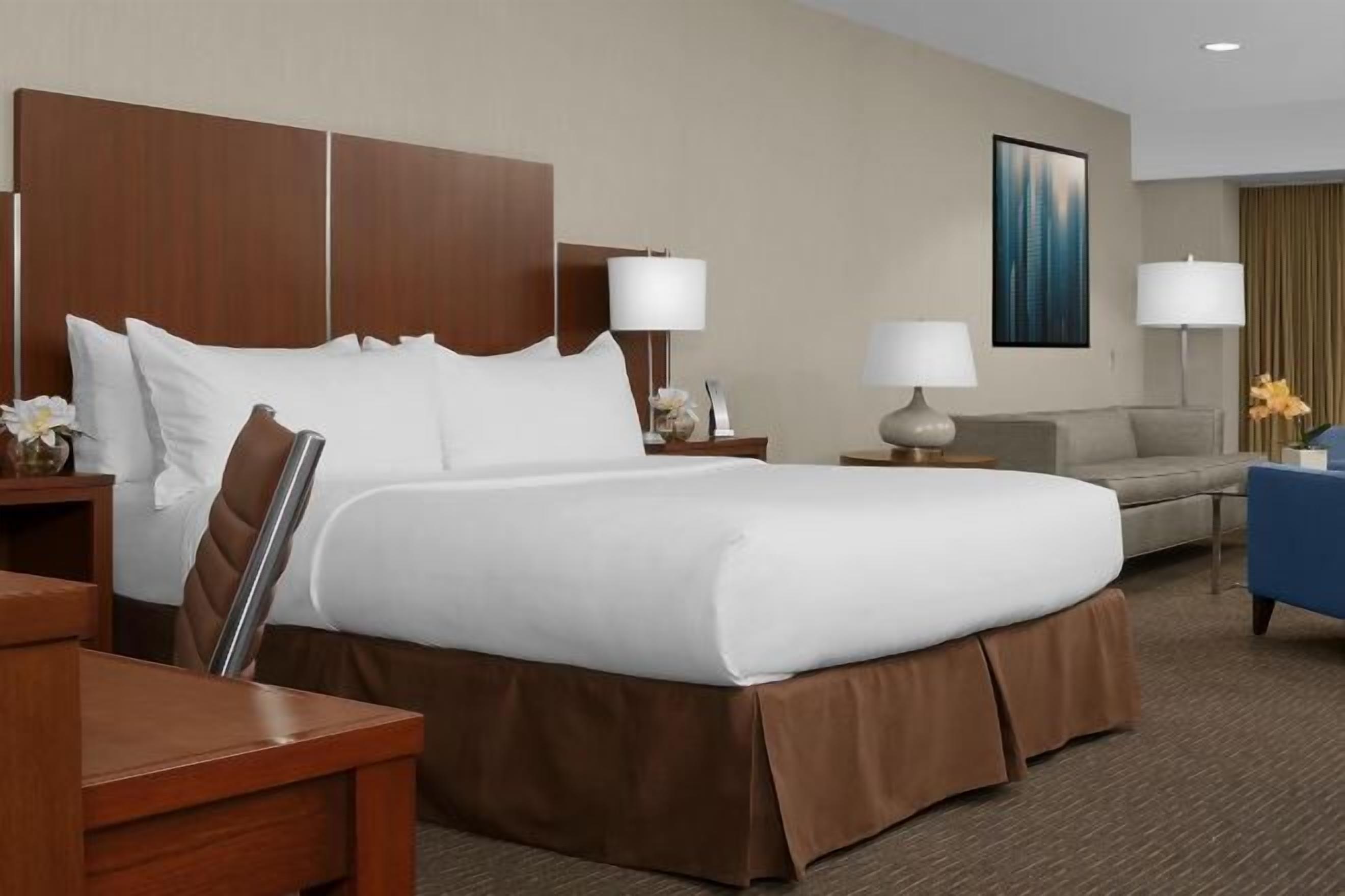 Premium bedding, pillow-top beds, in-room safe, desk