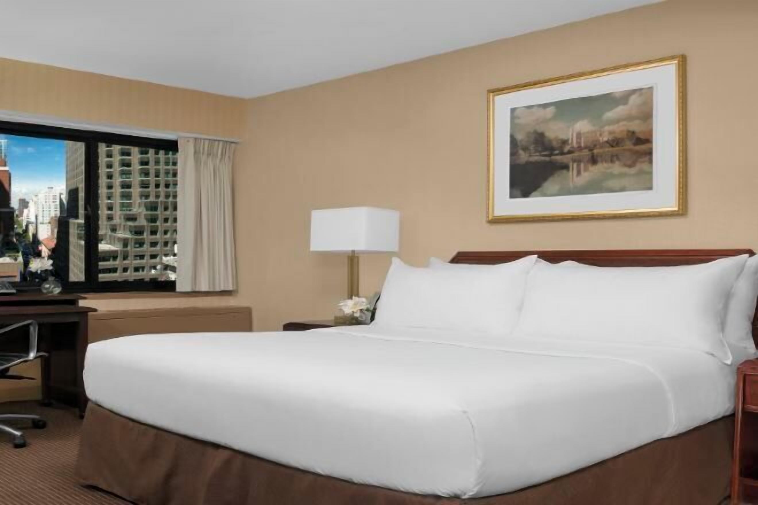 Premium bedding, pillow-top beds, in-room safe, desk