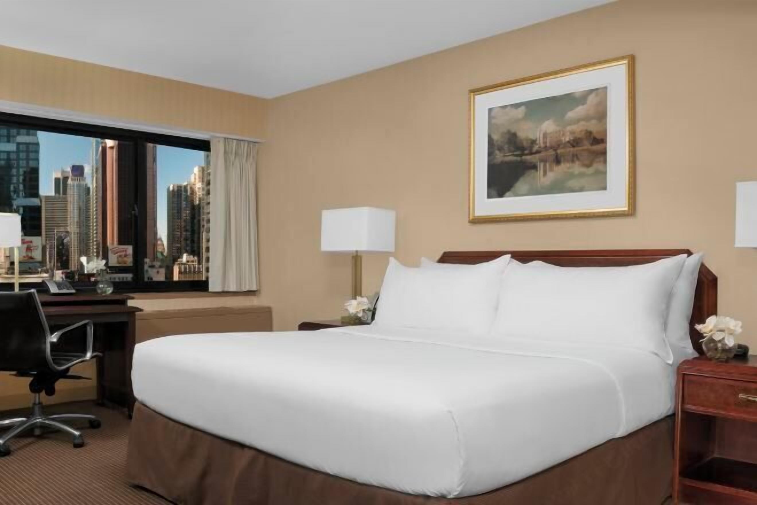 Premium bedding, pillow-top beds, in-room safe, desk