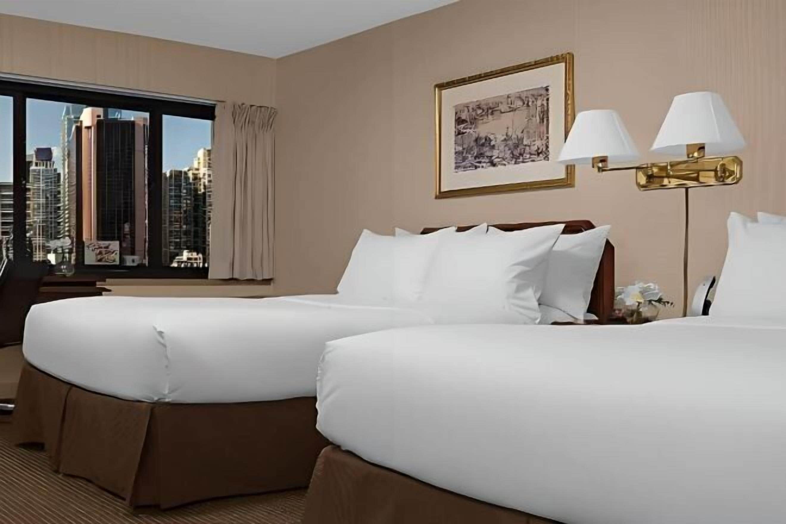 Premium bedding, pillow-top beds, in-room safe, desk