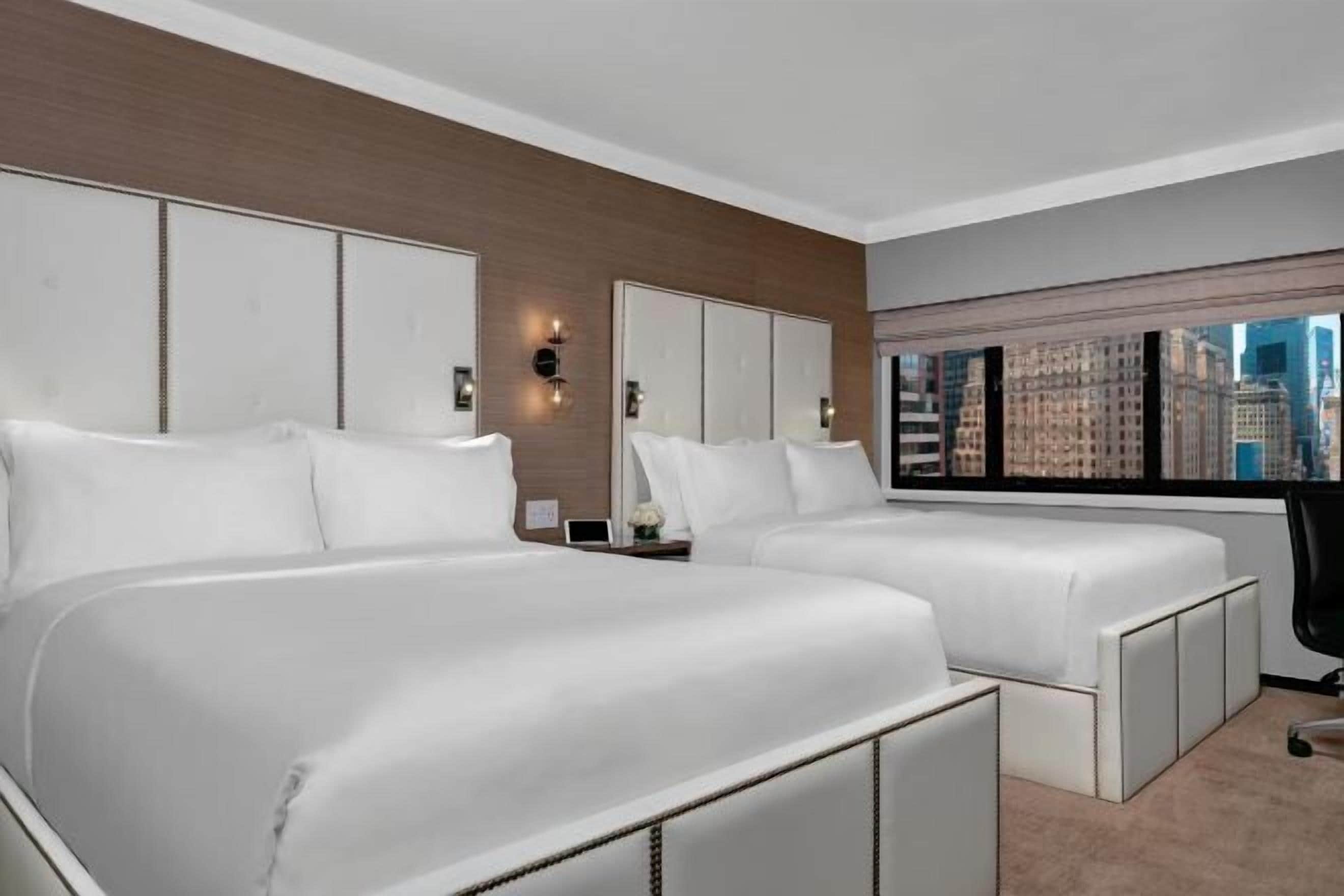 Premium bedding, pillow-top beds, in-room safe, desk