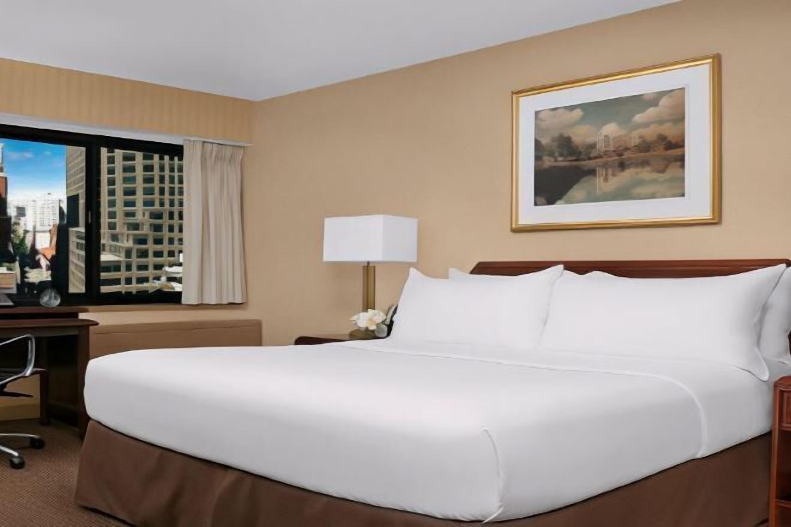 Premium bedding, pillow-top beds, in-room safe, desk