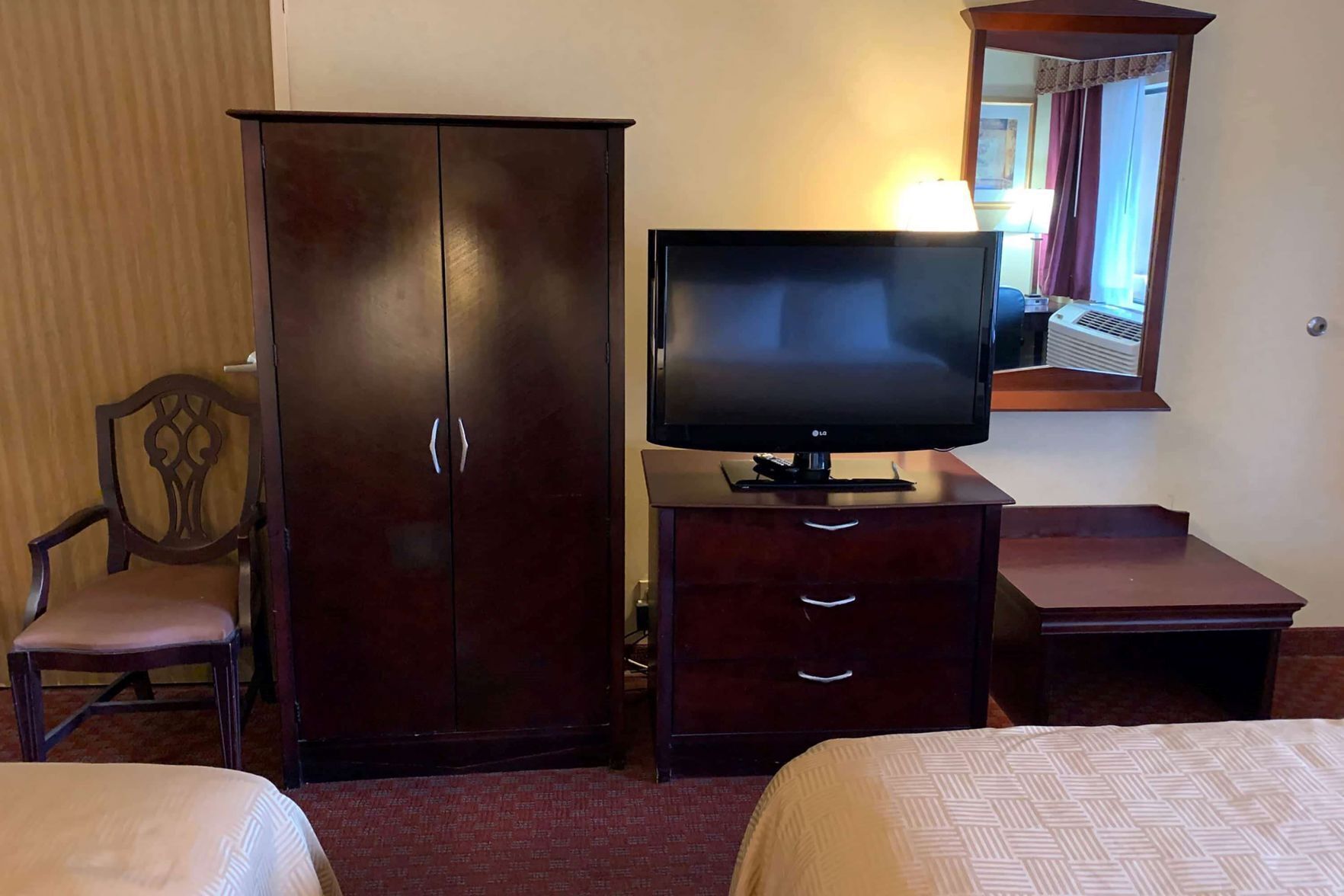 Desk, blackout drapes, soundproofing, iron/ironing board