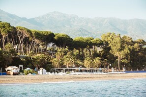 Enjoy stunning views of the sea from the open-air verandas of this coastal hotel.