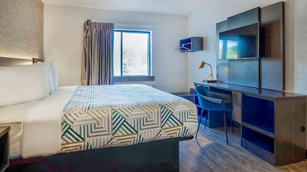 Escrivaninha, cortinas blackout, Wi-Fi de cortesia, roupa de cama