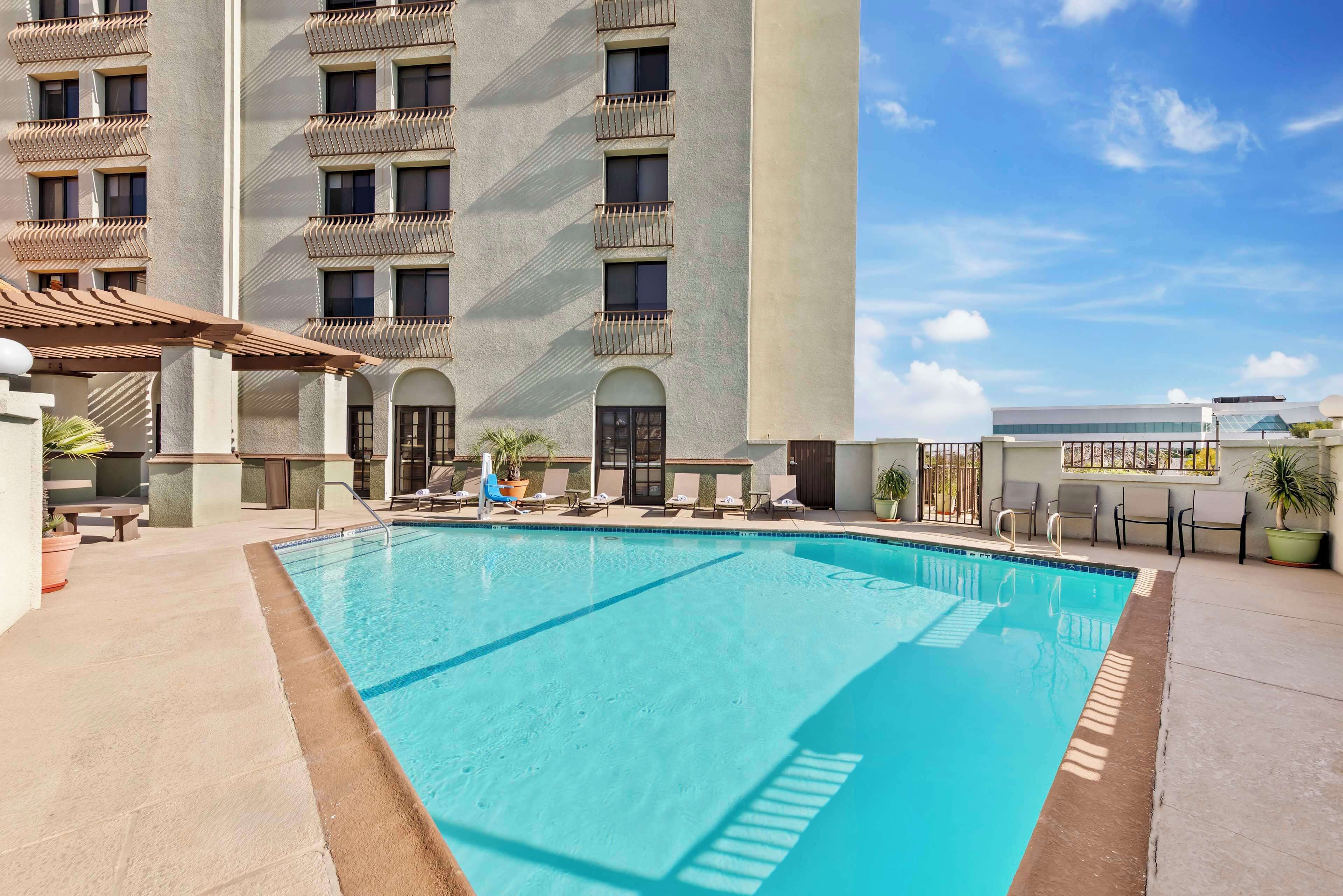 outdoor pool, pool loungers