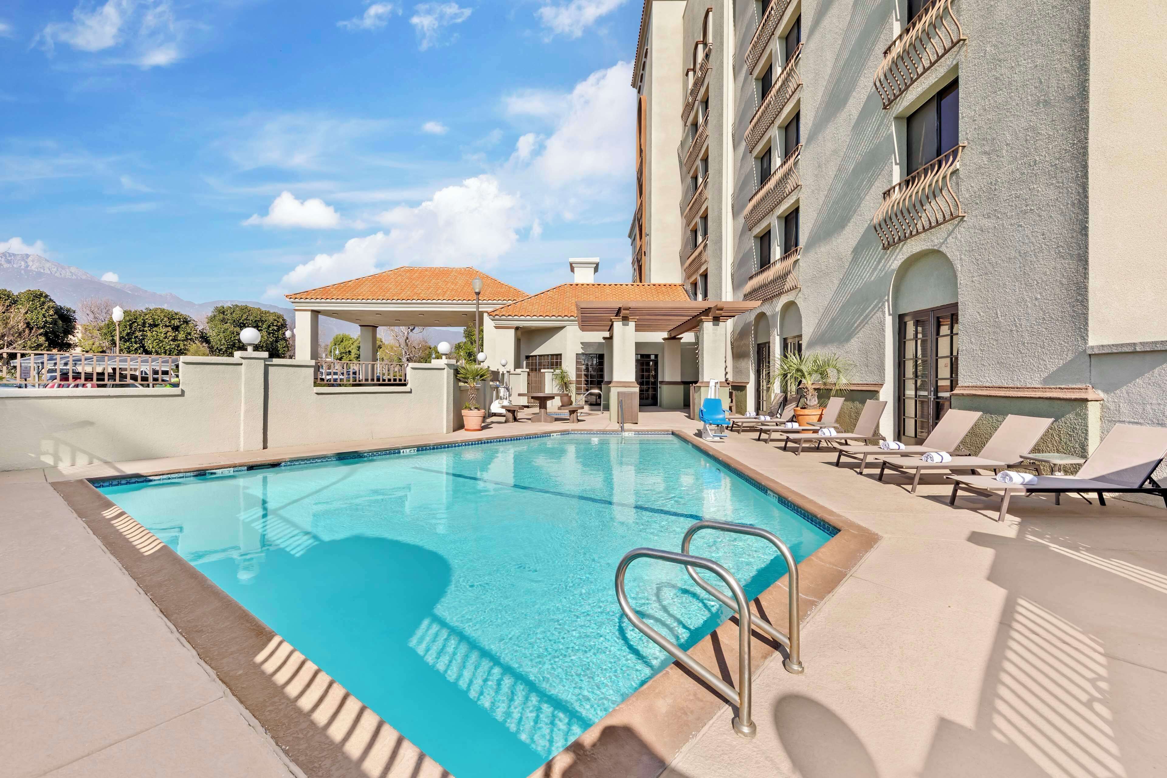 outdoor pool, pool loungers