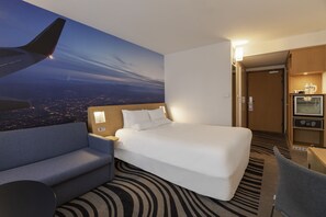 Ropa de cama de alta calidad y minibar 