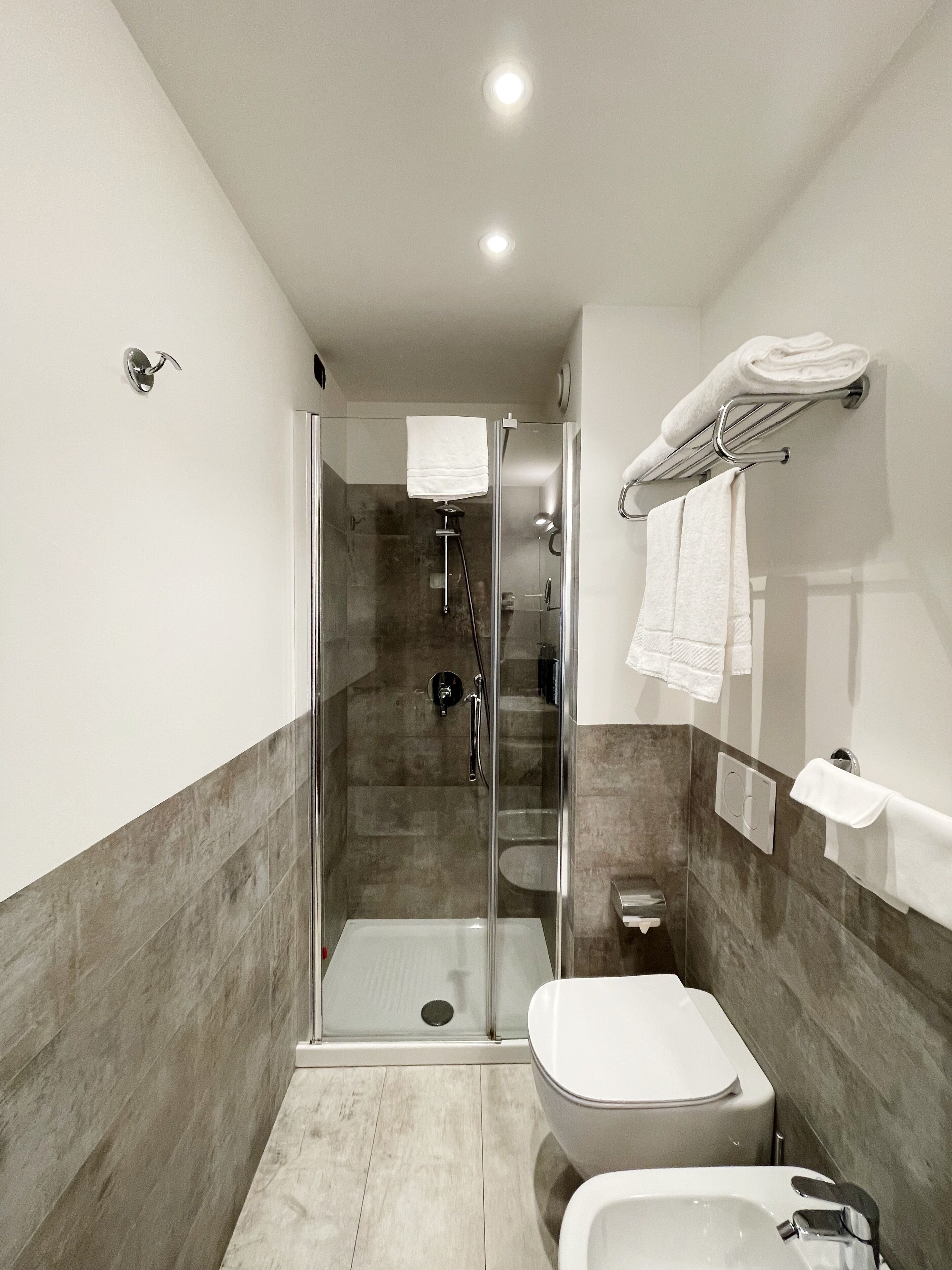 eco-friendly toiletries, hair dryer, bathrobes, slippers