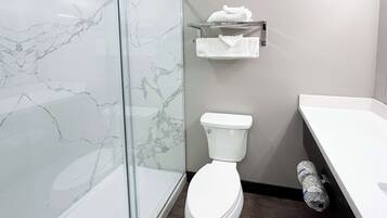 Eco-friendly toiletries, towels, shampoo, toilet paper