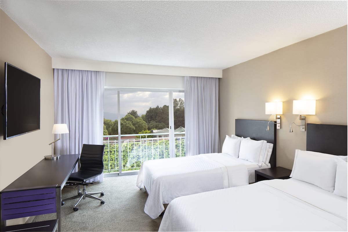 executive room, 2 double beds | in-room safe, iron/ironing board, free cots/infant beds