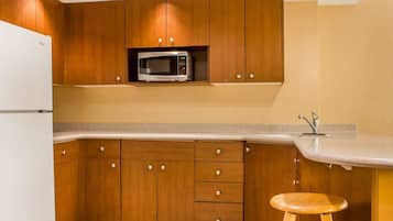 Efficiency, Suite, 1 King Bed with Sofa bed, Non Smoking | 1 bedroom, iron/ironing board, free cribs/infant beds, rollaway beds