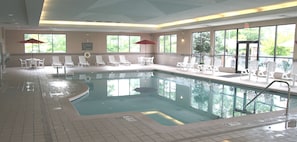 Indoor pool, open 9:00 AM to 10:00 PM, pool umbrellas, pool loungers