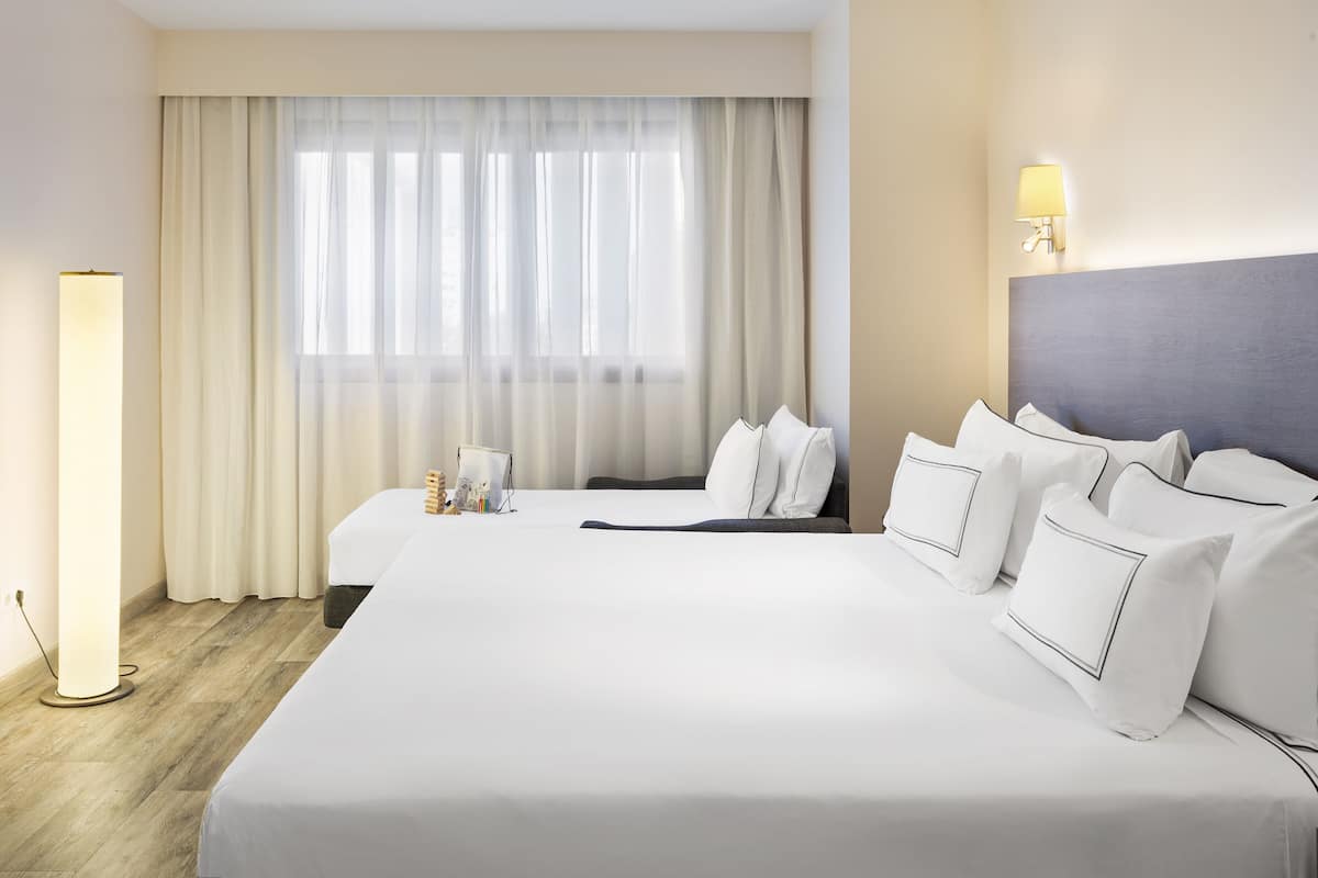 Pillowtop beds, in-room safe, desk, blackout drapes