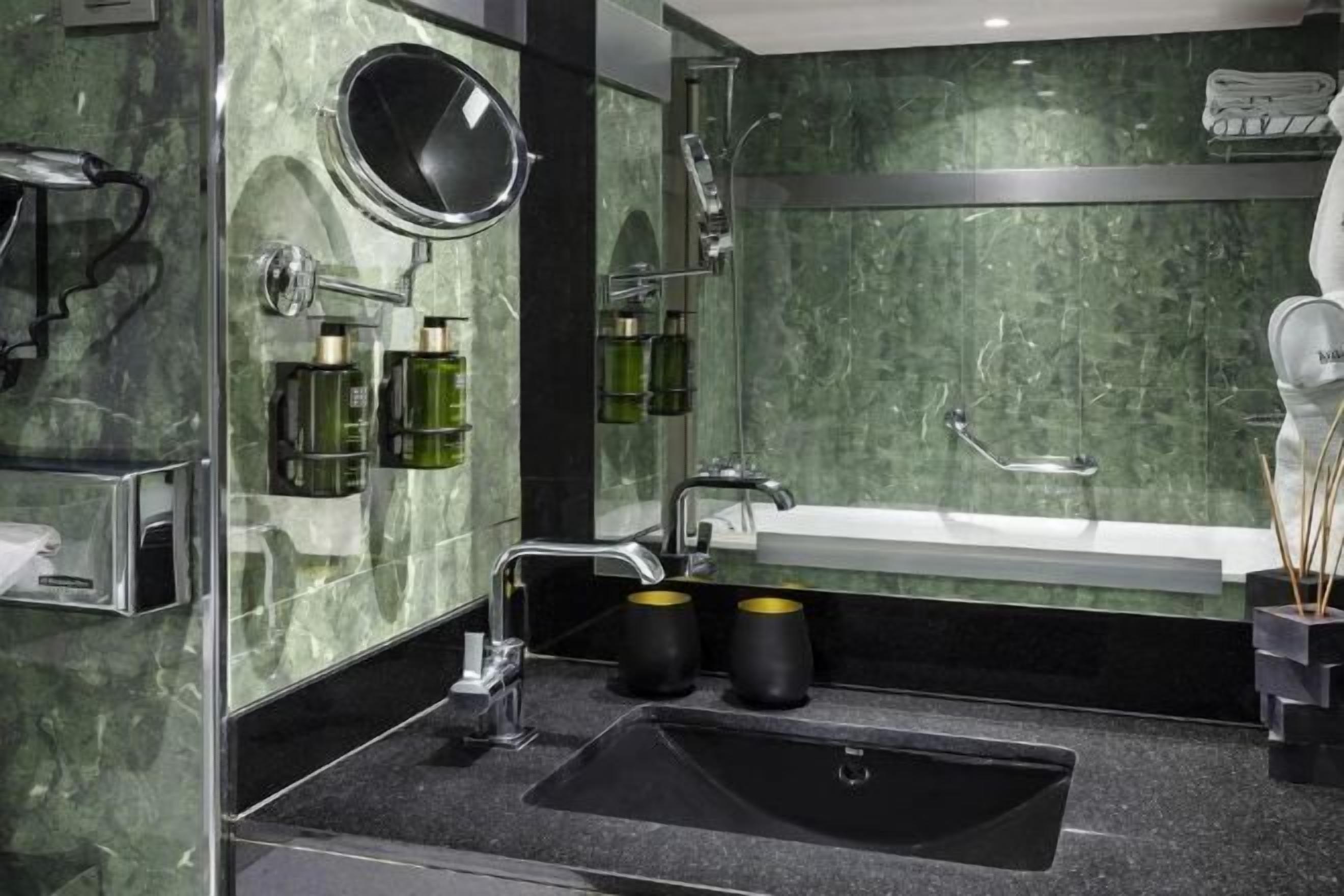 Eco-friendly toiletries, hair dryer, bathrobes, bidet