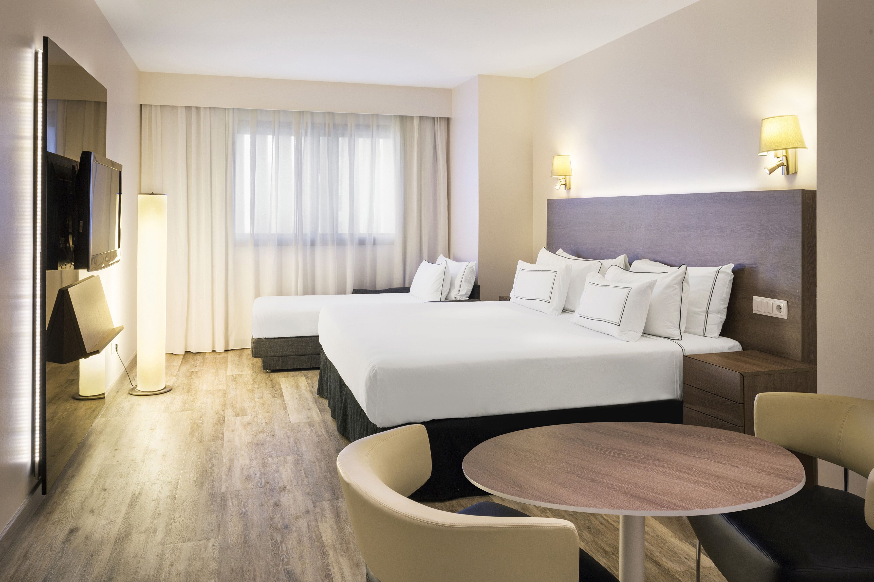 triple room (melia) | pillow-top beds, in-room safe, desk, blackout curtains