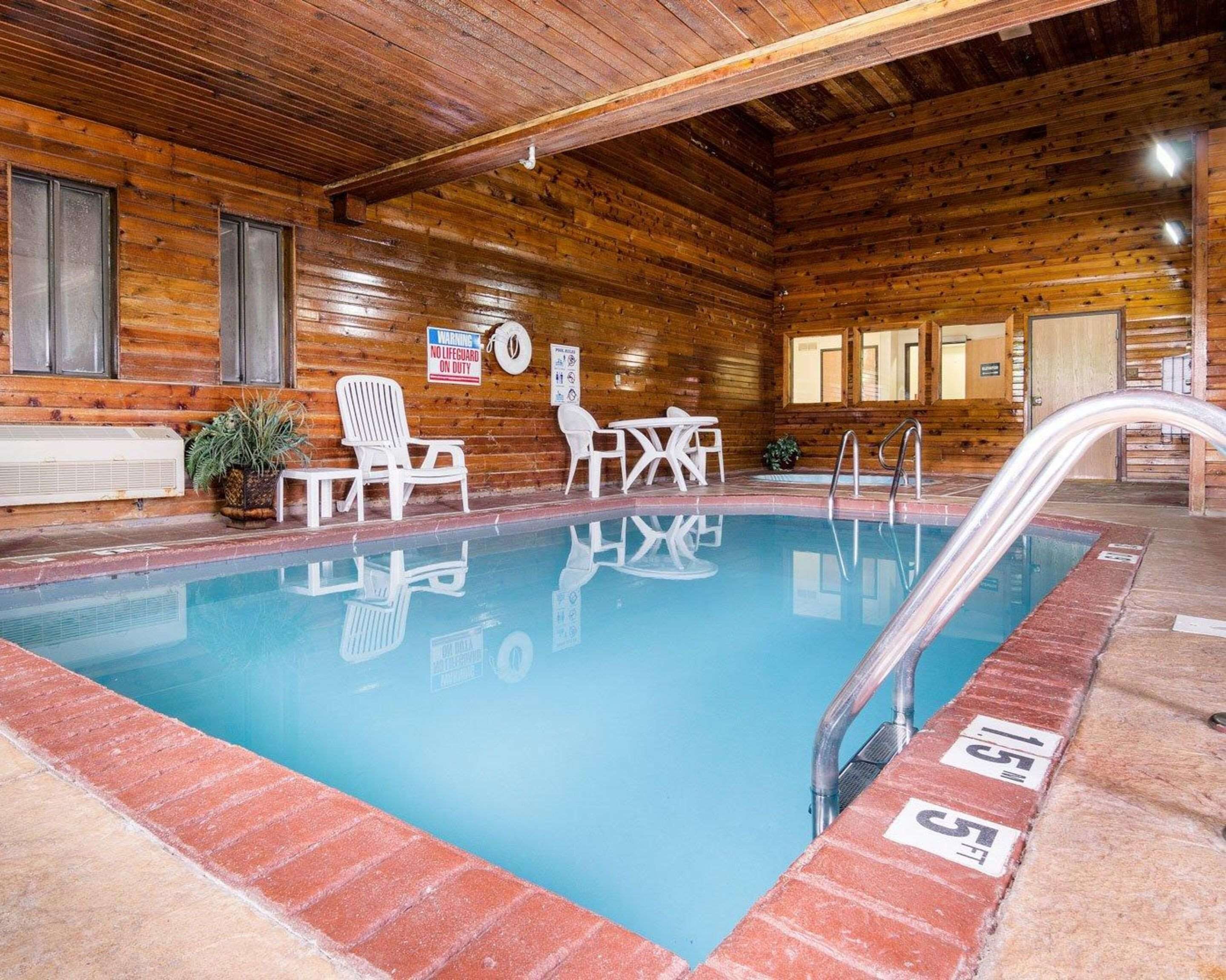 Indoor pool, open 9:00 AM to 10:00 PM, pool loungers