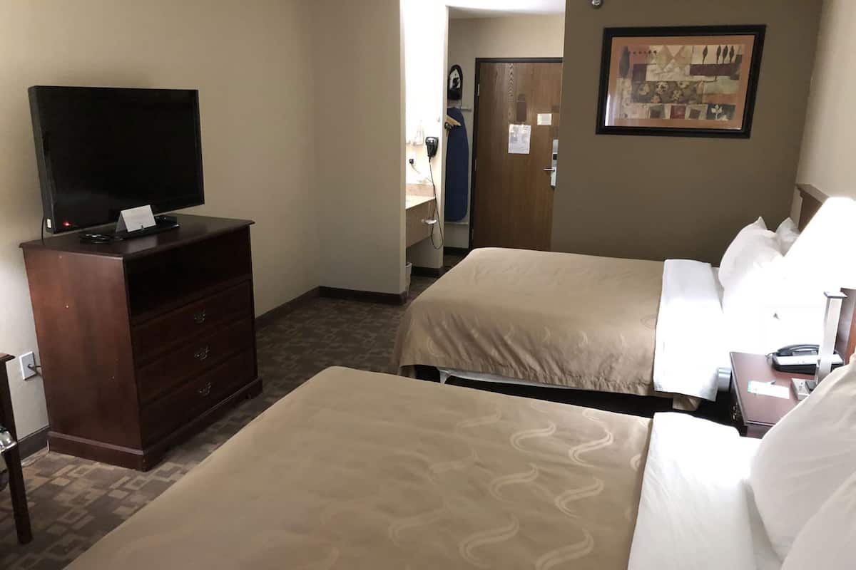 Hypo-allergenic bedding, pillow-top beds, in-room safe, desk