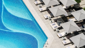 Outdoor pool, open 7:00 AM to 6:00 PM, pool umbrellas, sun loungers