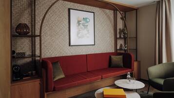 Junior Suite | Living area | Flat-screen TV
