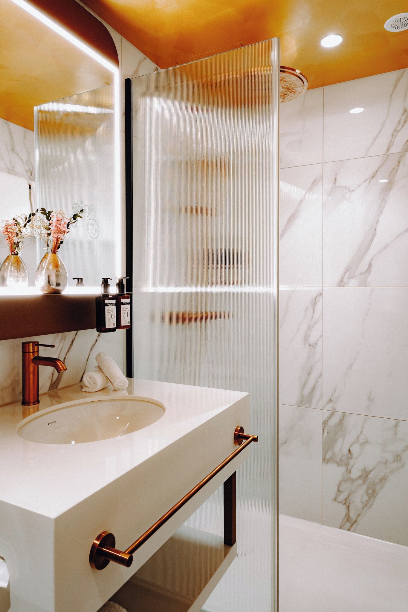 combined shower/bathtub, hair dryer, towels, soap