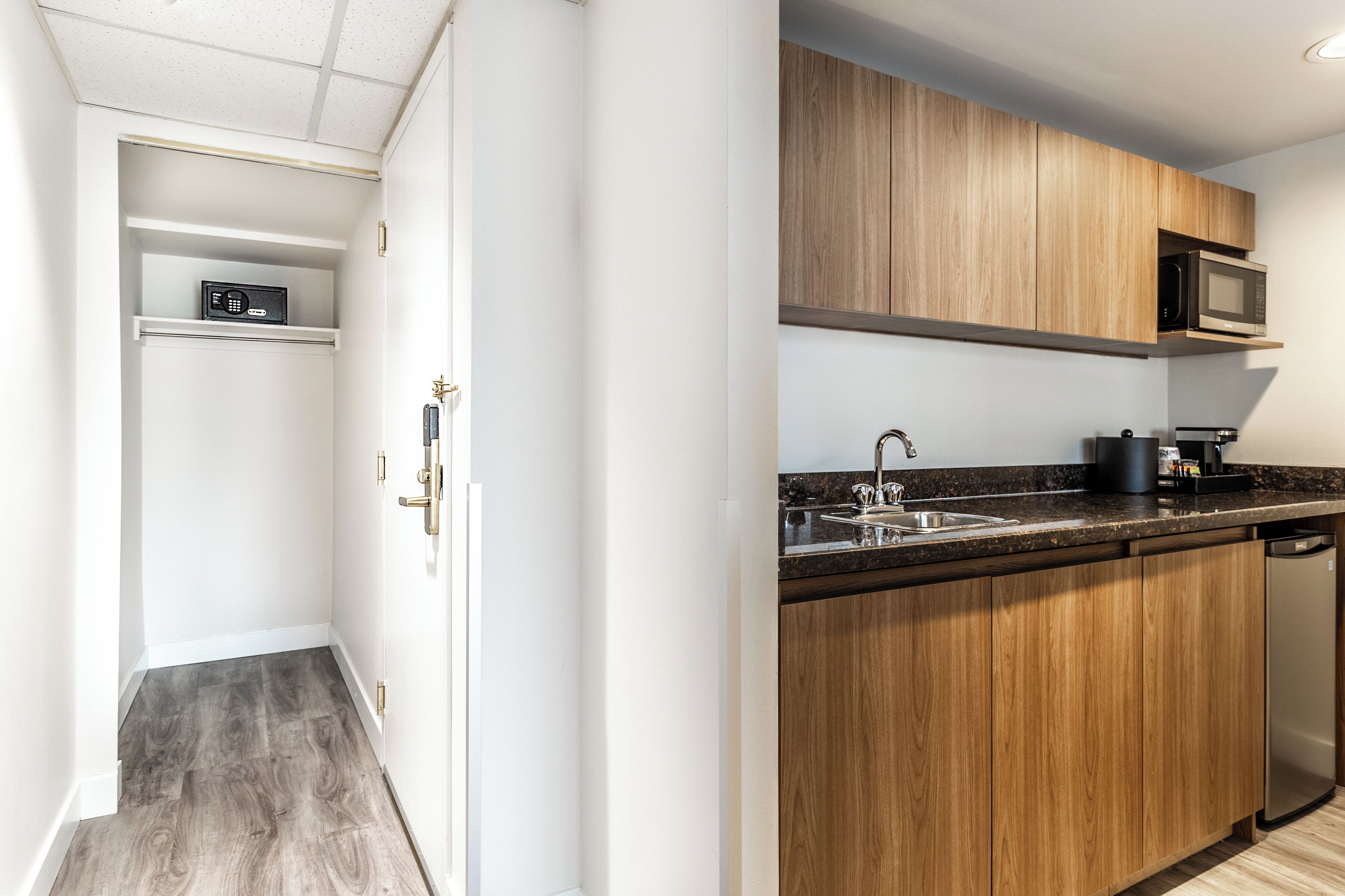 A modern kitchen with wooden cabinets, a microwave, and a dishwasher.