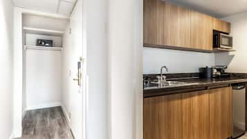 A modern kitchen with wooden cabinets, a microwave, and a dishwasher.