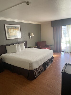 Deluxe Single Room, 1 Bedroom | Desk, laptop workspace, blackout drapes, iron/ironing board - Hospitality Inn San Bernardino/ Redlands  (San Bernardino)