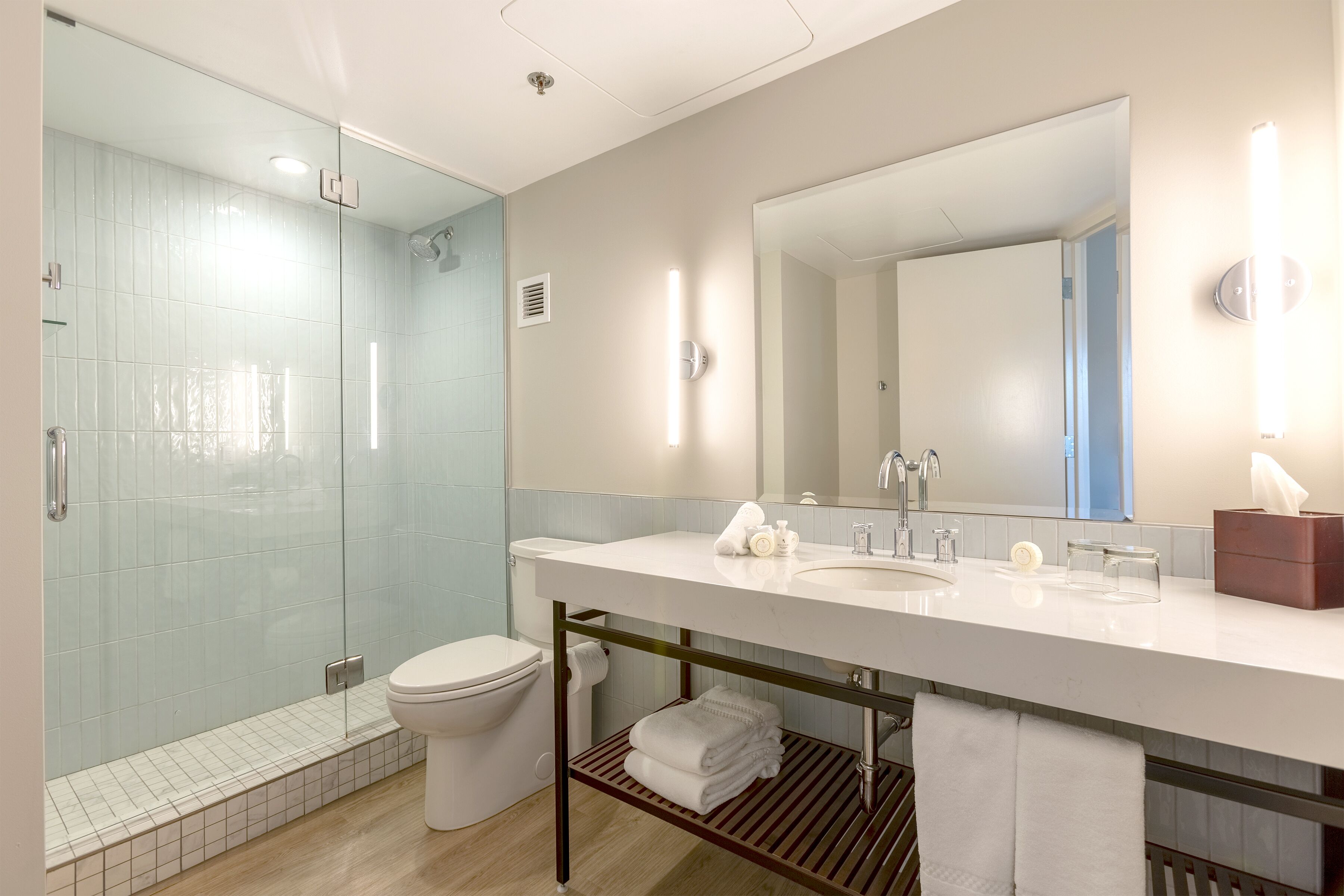 deluxe room, 2 queen beds, bay view (deluxe double ada, 2 queen beds, roll) | bathroom | combined shower/bathtub, eco-friendly toiletries, hair dryer, towels
