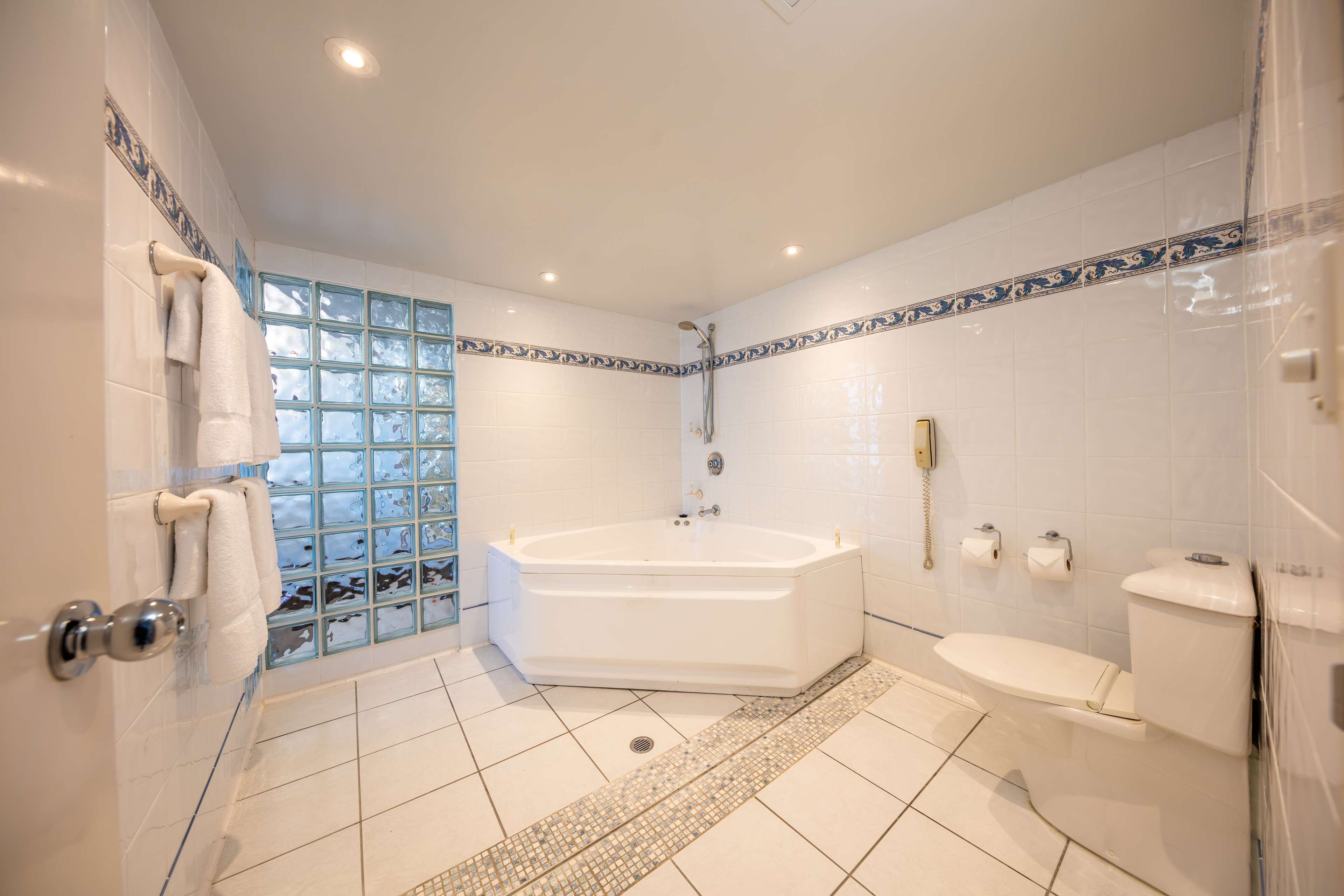 king one bedroom suite | bathroom | free toiletries, hair dryer, bathrobes, slippers