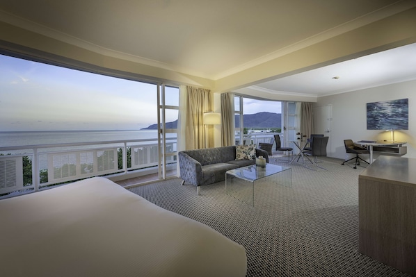 King One Bedroom Suite | Living area | 55-inch LCD TV with satellite channels, TV, pay movies - DoubleTree by Hilton Hotel Cairns (Cairns)