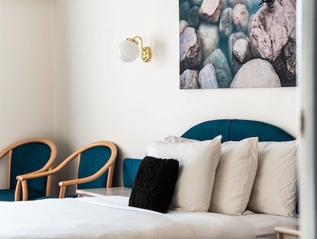 Family Suite (No Pets) | Pillowtop beds, minibar, individually decorated, individually furnished