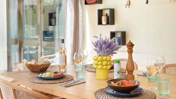 Lunch, dinner served; international cuisine, al fresco dining