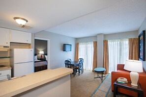 32-inch TV with cable channels - Enclave Suites by Sky Hotels & Resorts (Orlando)