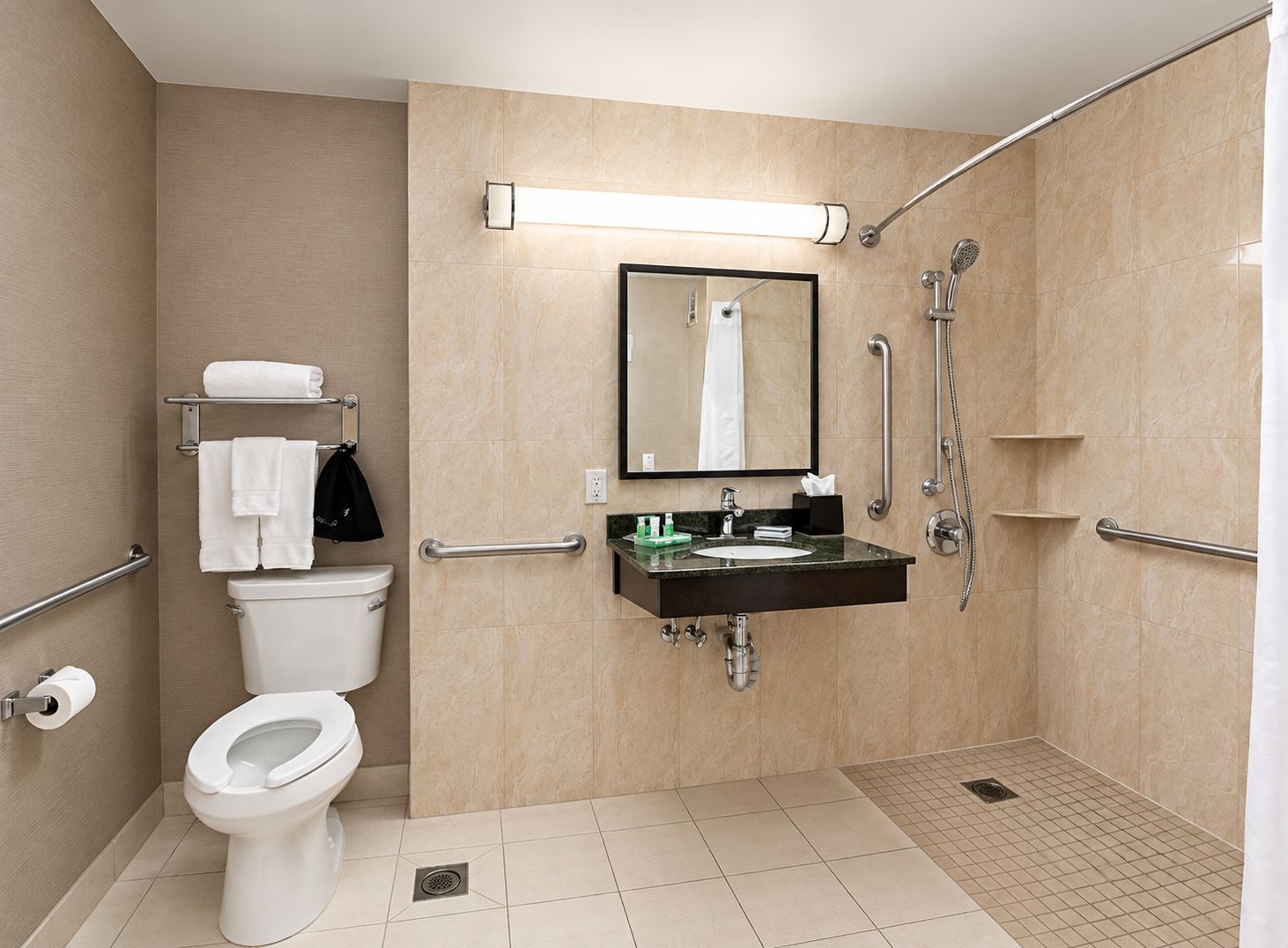 A modern bathroom with a toilet, sink, and shower.